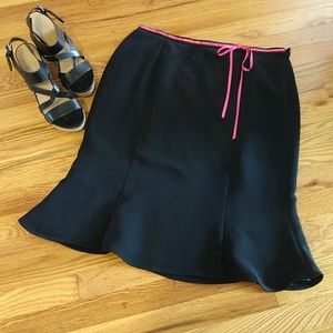 Black skirt, with a fun pink bow!